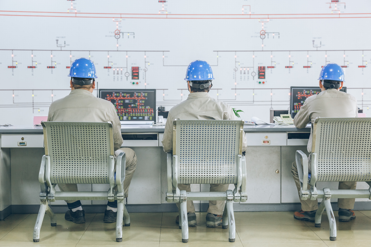 workers in control room - Energy